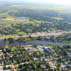 Aerial view of Camrose with Mirror Lake in the foreground